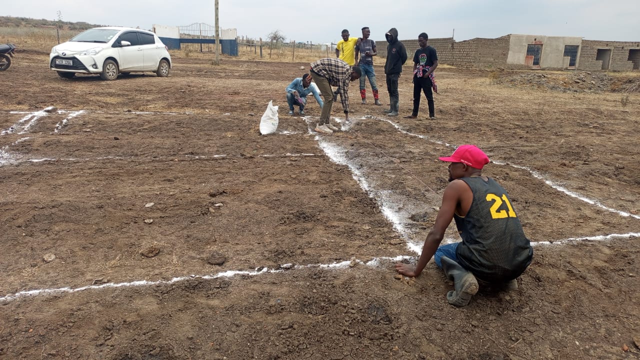 People visiting a land development site in Syokimau